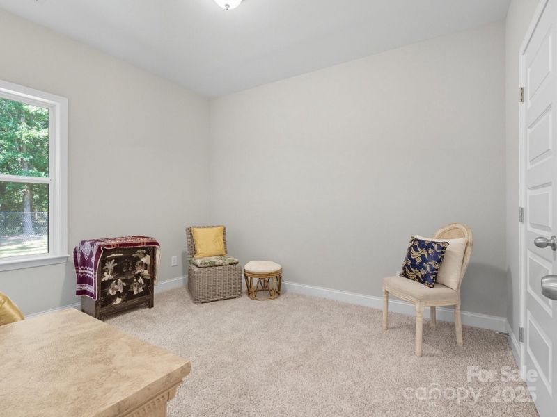Furnished interior view inside a new home in , Wingate (Image 12).