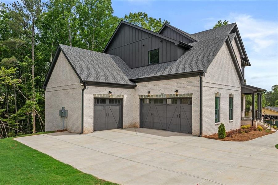 Front exterior of a new home in , Buford, GA, highlighting curb appeal (Image 24).