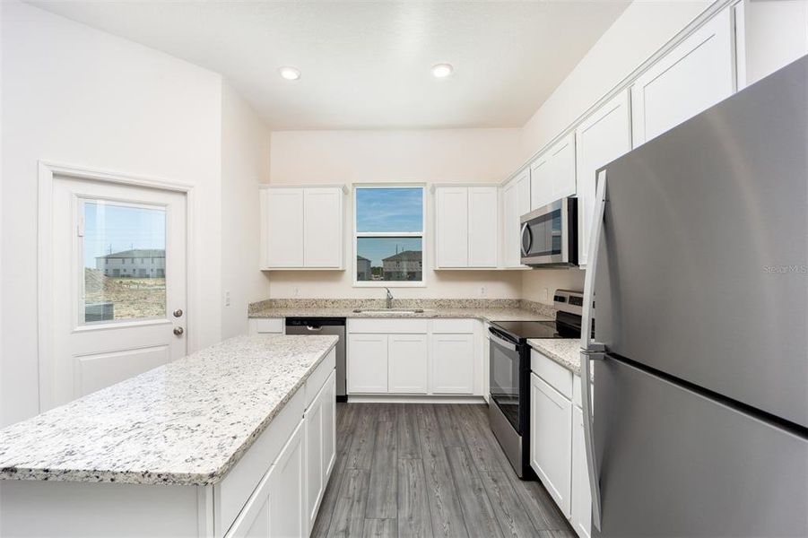 Furnished interior view inside a new home in Sol Vista, Dundee (Image 5).