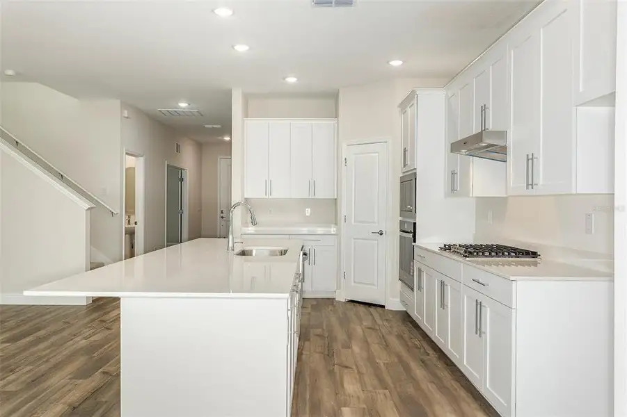 Furnished interior view inside a new home in Pasadena Woods, Dade City (Image 8).
