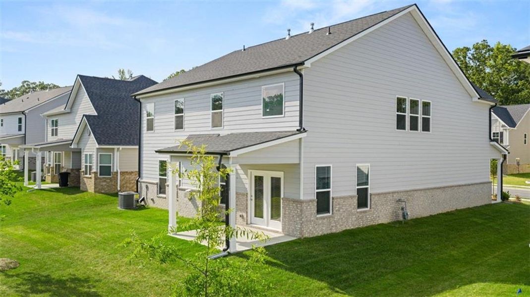 Exterior details and patio area of a home in Wildwood, Covington (Image 28).