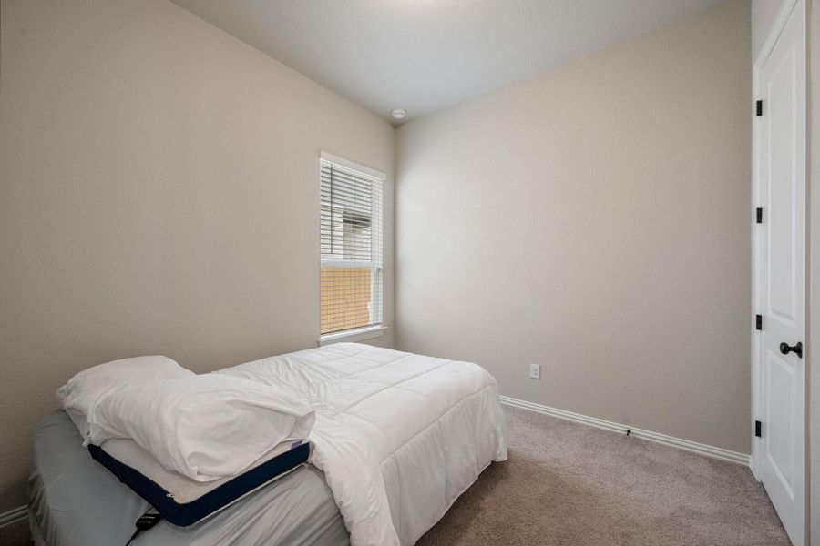 Furnished interior view inside a new home in Heritage, Dripping Springs (Image 16).