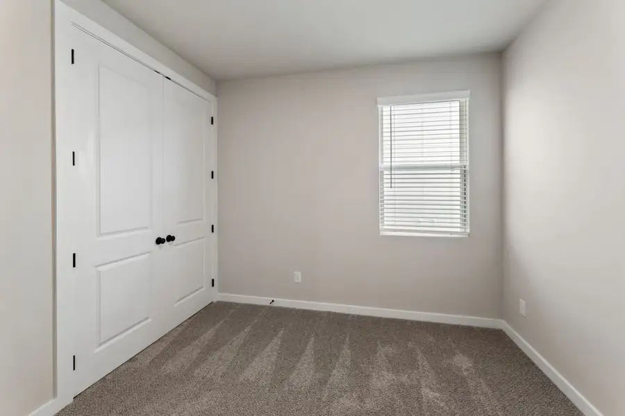Representative unfurnished interior of a home built from the Pecos by Hakes Brothers in Highland Ridge, New Braunfels (Image 34).