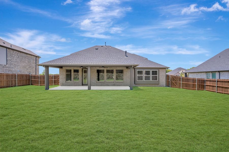 Exterior details and patio area of a home in View at the Reserve, Mansfield (Image 3).