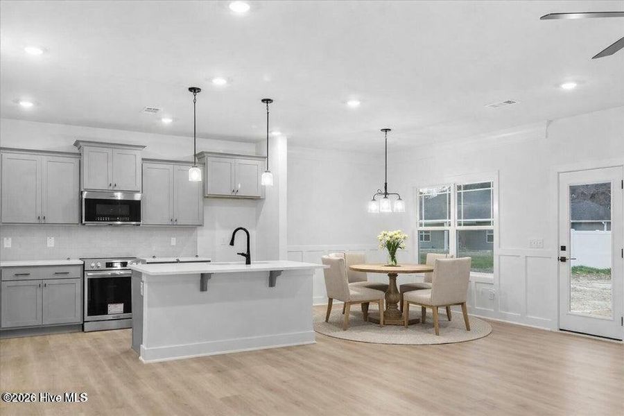 Furnished interior view inside a new home in Wood Creek Landing, Leland (Image 11).