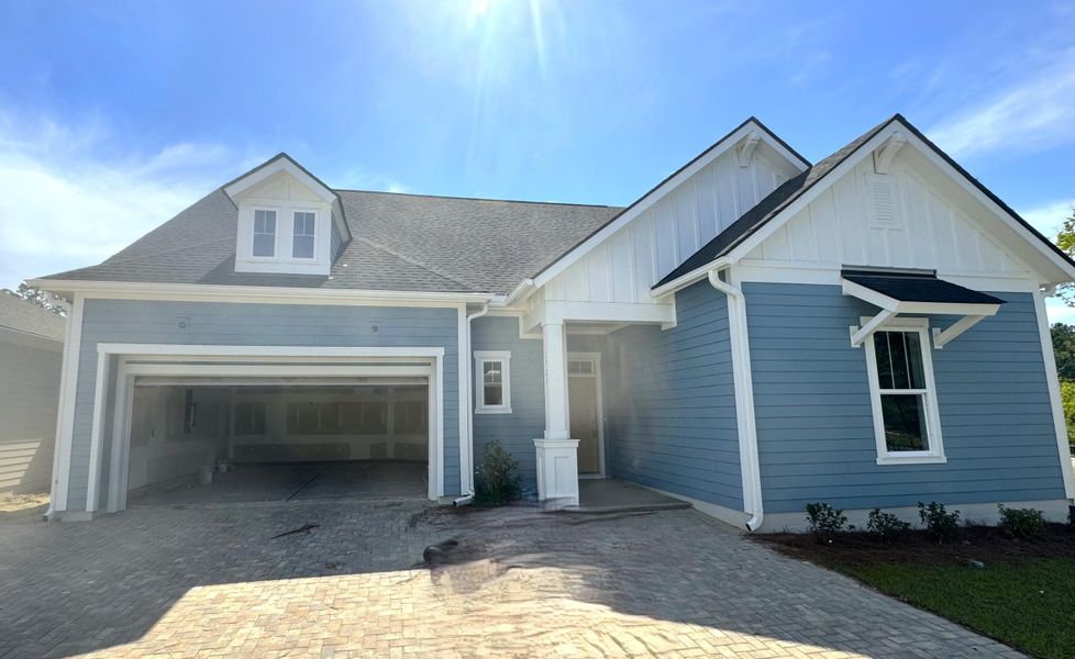 Front exterior of a new home in Nexton – Midtown – The Garden Collection, Summerville, SC, highlighting curb appeal (Image 24). Front exterior of a new home in Nexton – Midtown – The Garden Collection, Summerville, SC, highlighting curb appeal (Image 24).