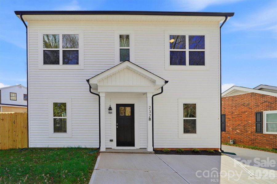 Exterior details and patio area of a home in , Mooresville (Image 16).