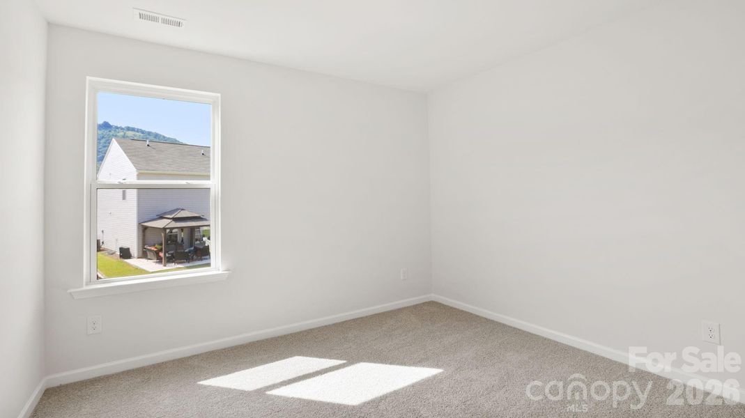 Spacious, unfurnished interior of a new home in Wildbrook Village, Waynesville (Image 28).