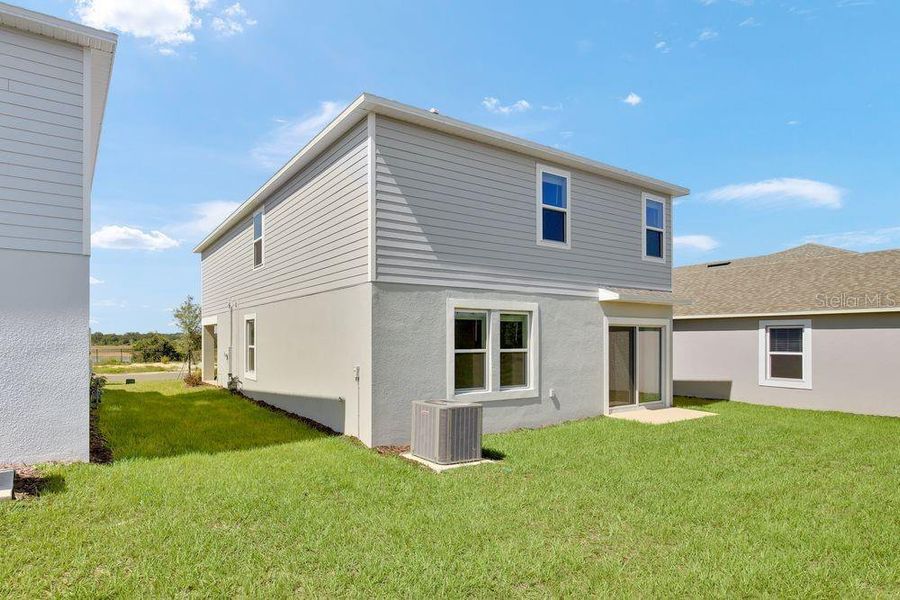 Exterior details and patio area of a home in Waterstone, Groveland (Image 4). Exterior details and patio area of a home in Waterstone, Groveland (Image 4).