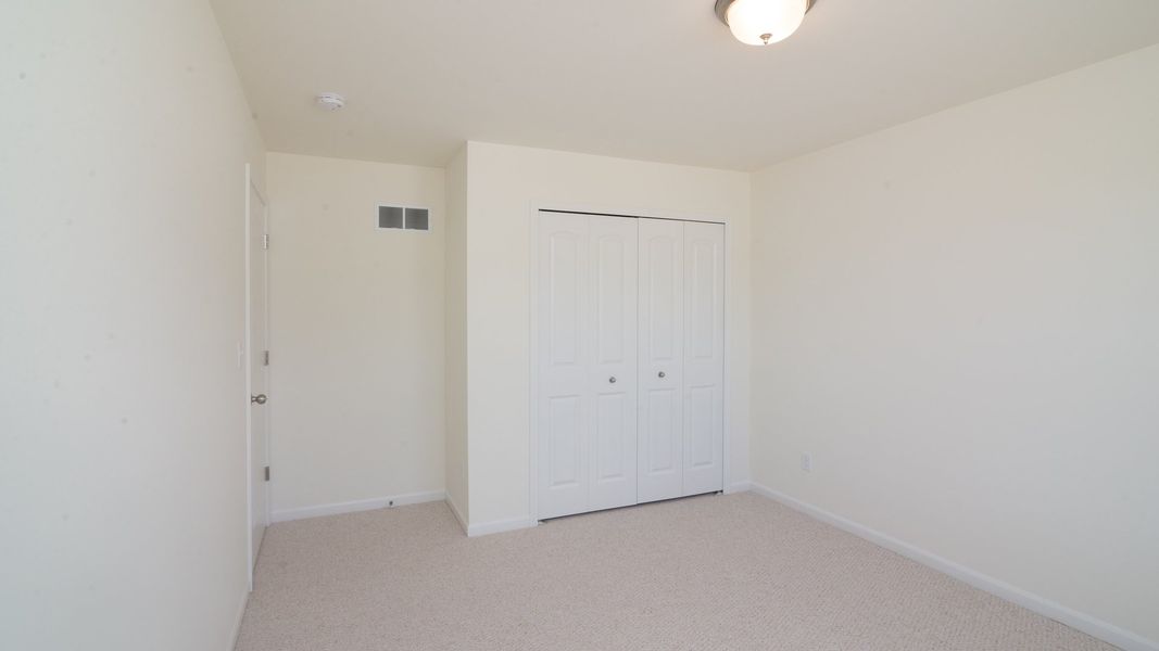 Representative unfurnished interior of a home built from the The Briarhaven III Side Entry by Norfolk Homes in Fosdick Glen of Saline, Saline (Image 62).