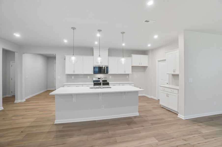 Furnished interior view inside a new home in Waxhaw Landing, Monroe (Image 7).