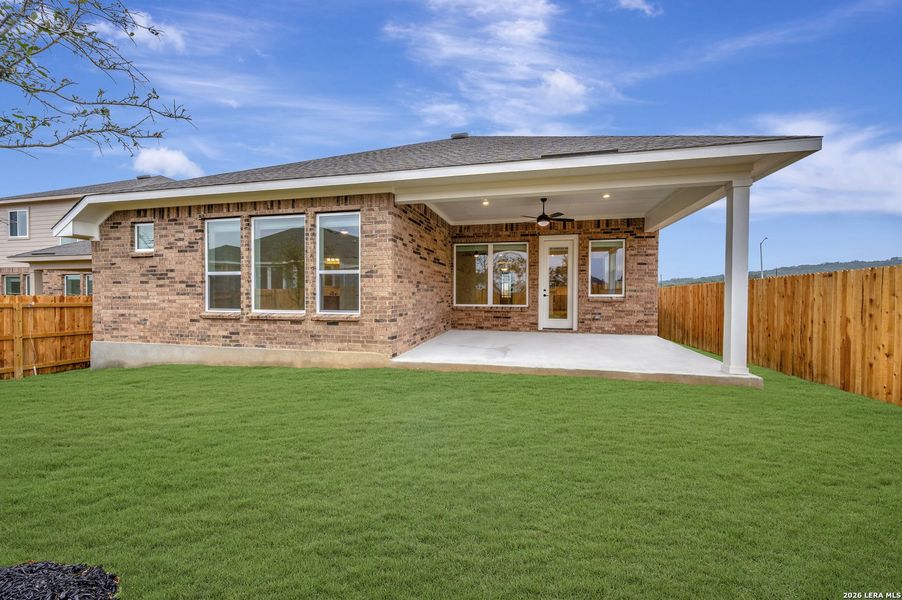 Exterior details and patio area of a home in Davis Ranch 50', San Antonio (Image 21).