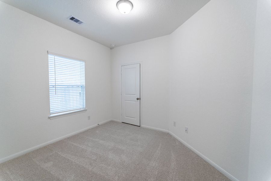 Spacious, unfurnished interior of a new home in Windrose Green, Angleton (Image 13).