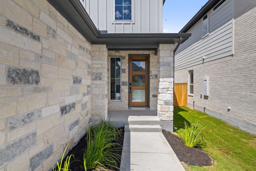 Exterior details and patio area of a home in Heritage, Dripping Springs (Image 3).