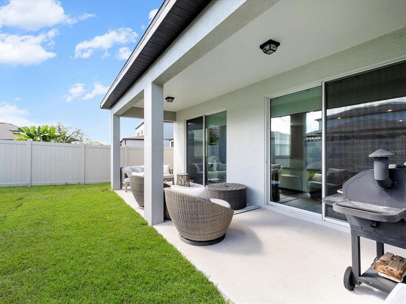 Exterior details and patio area of a home in , Land O' Lakes (Image 22).