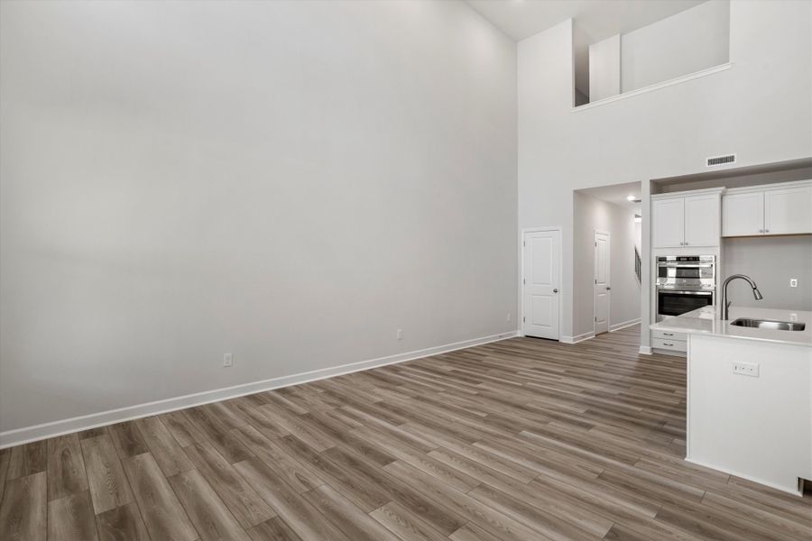 Spacious, unfurnished interior of a new home in Ovation at Sweetbrier, Durham (Image 17).