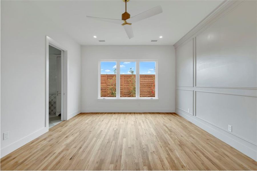Spare room featuring light wood-style flooring and recessed lighting