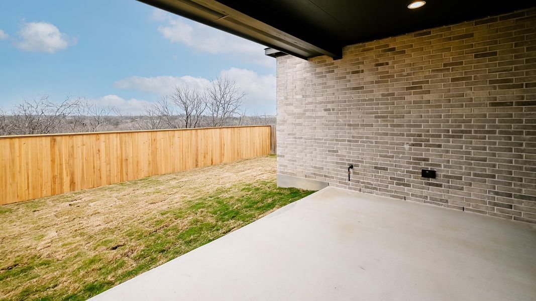 Exterior details and patio area of a home in Crosswinds, Kyle (Image 4).