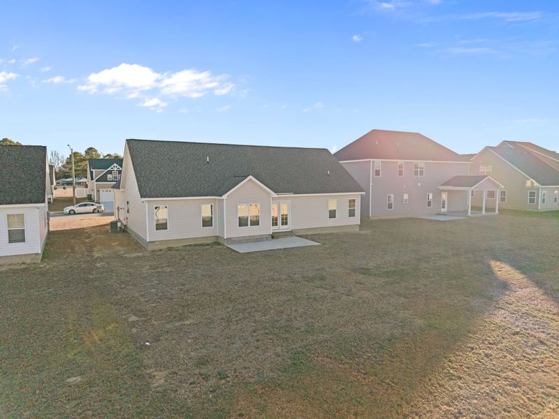 Exterior details and patio area of a home in Arbor Hills South II, Greenville (Image 28).