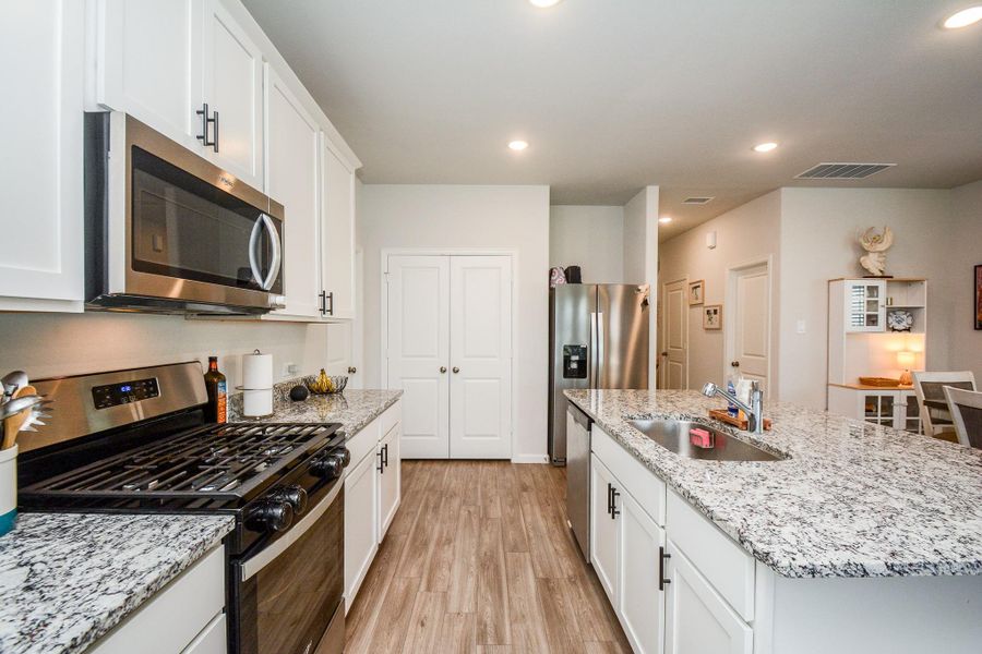Furnished interior view inside a new home in Granger Pines, Conroe (Image 13).