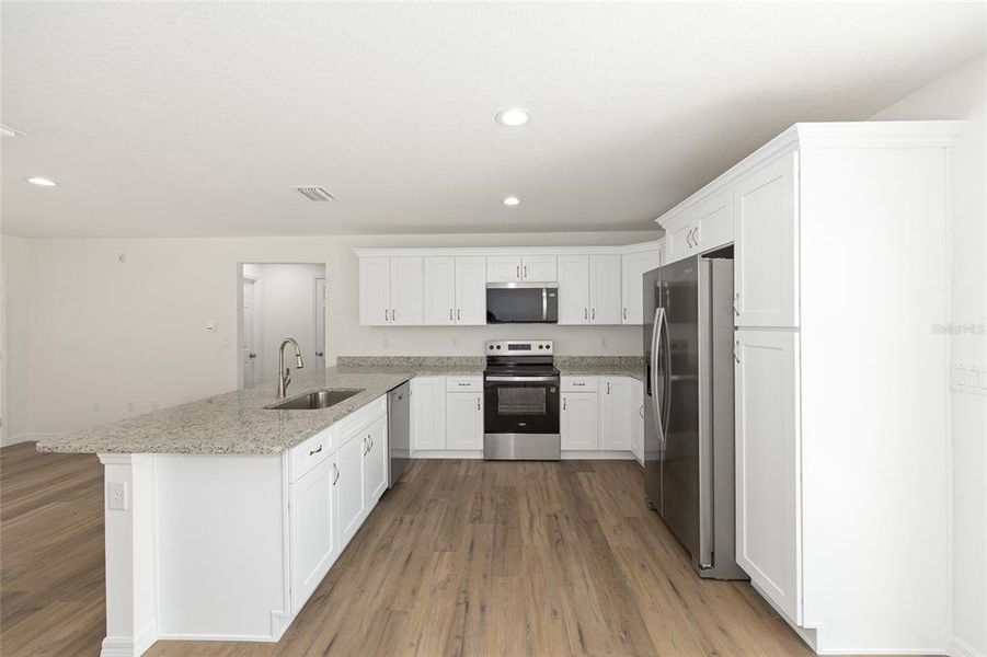 Furnished interior view inside a new home in , Dunnellon (Image 19).