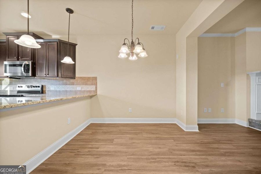 Spacious, unfurnished interior of a new home in Garden Walk, Jackson (Image 11).