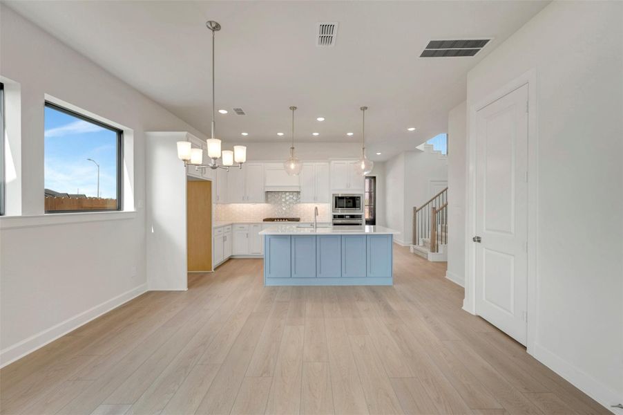 Furnished interior view inside a new home in Sienna - Landmark Row Collection, Missouri City (Image 8). Furnished interior view inside a new home in Sienna - Landmark Row Collection, Missouri City (Image 8).