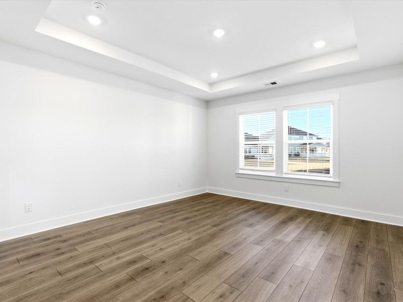 Spacious, unfurnished interior of a new home in The Coves at Lakes of Cane Bay, Summerville (Image 22). Spacious, unfurnished interior of a new home in The Coves at Lakes of Cane Bay, Summerville (Image 22).