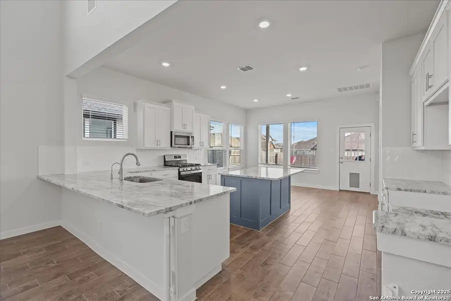 Furnished interior view inside a new home in August Fields, New Braunfels (Image 8).