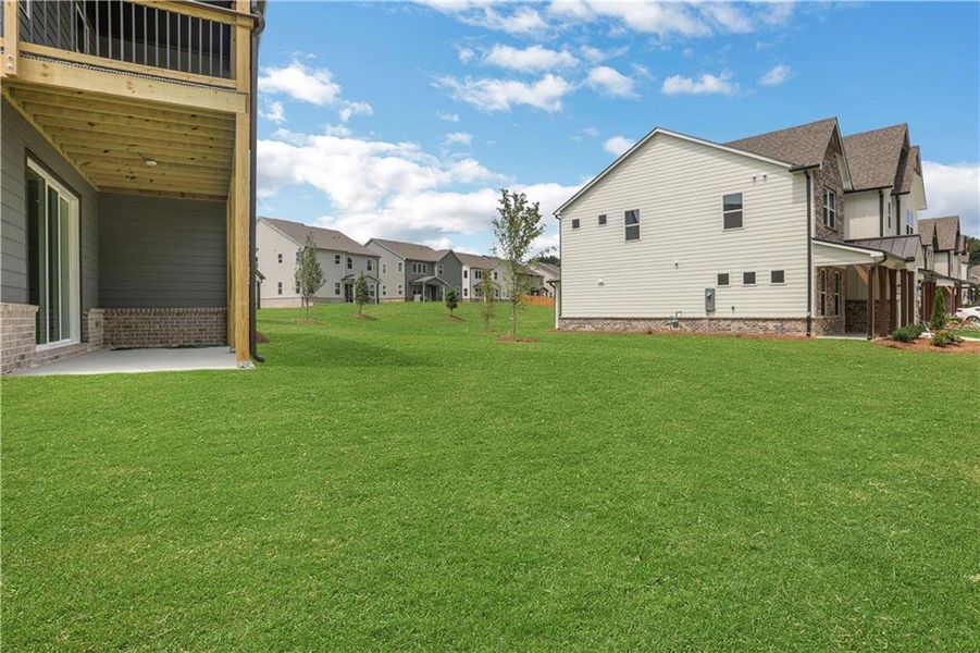Exterior details and patio area of a home in The Paddocks at Doc Hughes, Buford (Image 29).