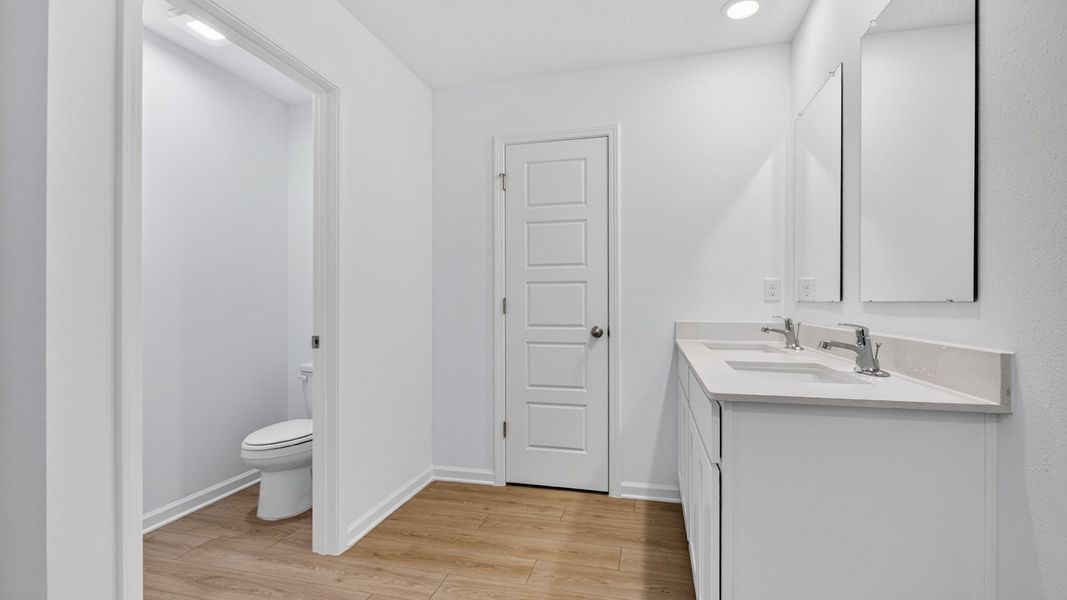 Representative furnished interior of a home built from the Elston+ by D.R. Horton in Diamond Springs, Jacksonville (Image 7).