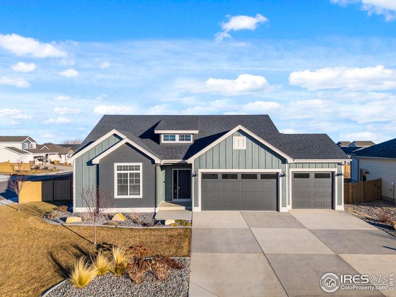 Front exterior of a new home in , Wellington, CO, highlighting curb appeal (Image 25).