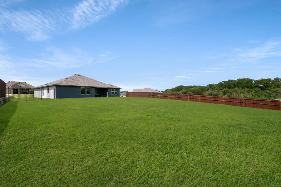 Front exterior of a new home in Mountain Valley, Burleson, TX, highlighting curb appeal (Image 10).