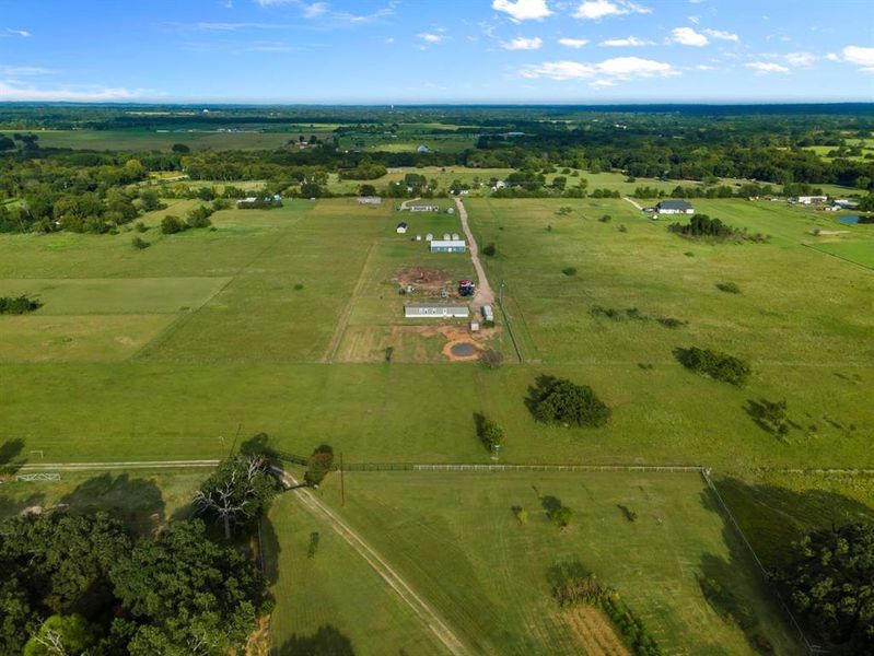 Aerial view of sparsely populated area with a pastoral area Aerial view of sparsely populated area with a pastoral area