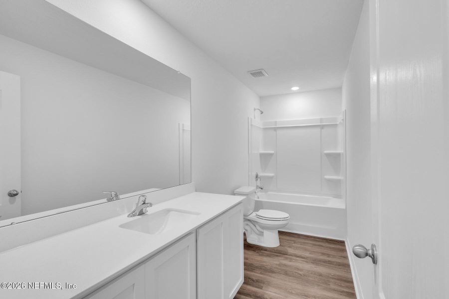 Furnished interior view inside a new home in Rolling Hills, Green Cove Springs (Image 8).