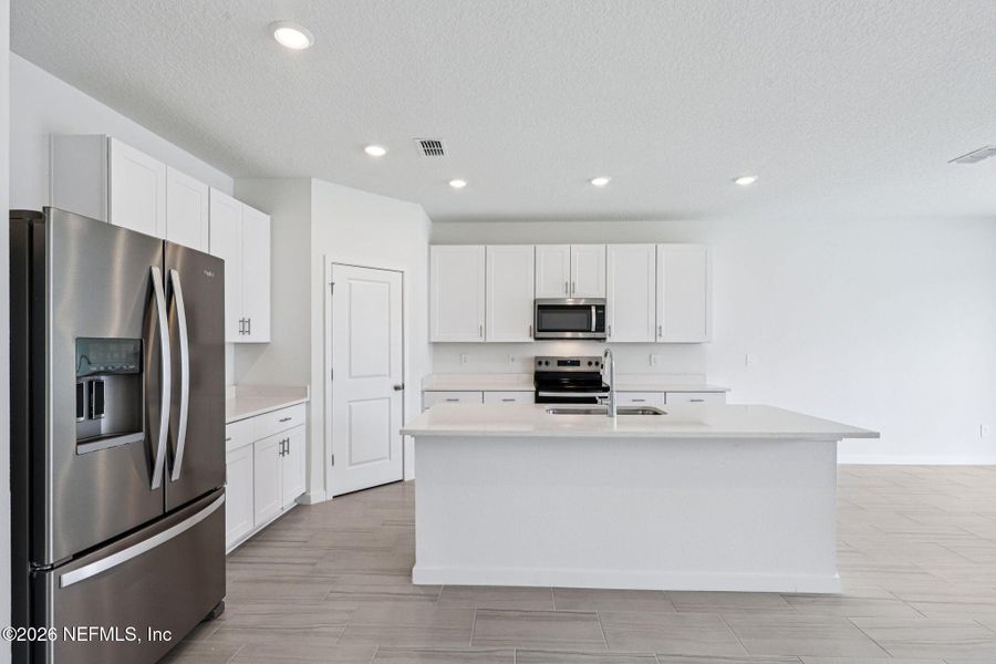 Furnished interior view inside a new home in Flagler Village - Signature Series, Palm Coast (Image 6).