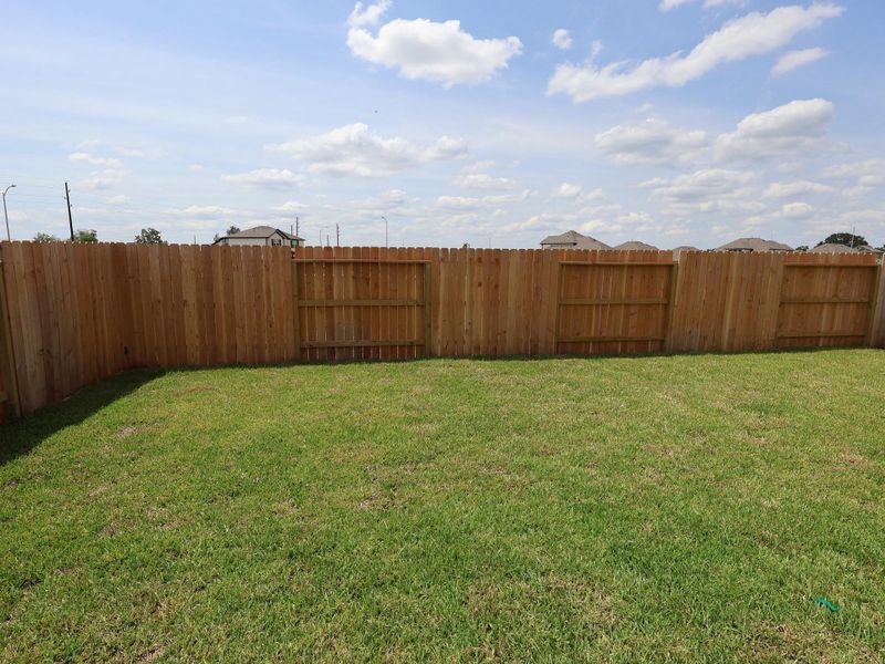 Front exterior of a new home in Summerview, Fulshear, TX, highlighting curb appeal (Image 13). Front exterior of a new home in Summerview, Fulshear, TX, highlighting curb appeal (Image 13).