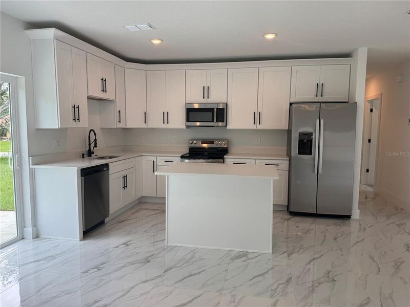 Furnished interior view inside a new home in , Citrus Springs (Image 6).