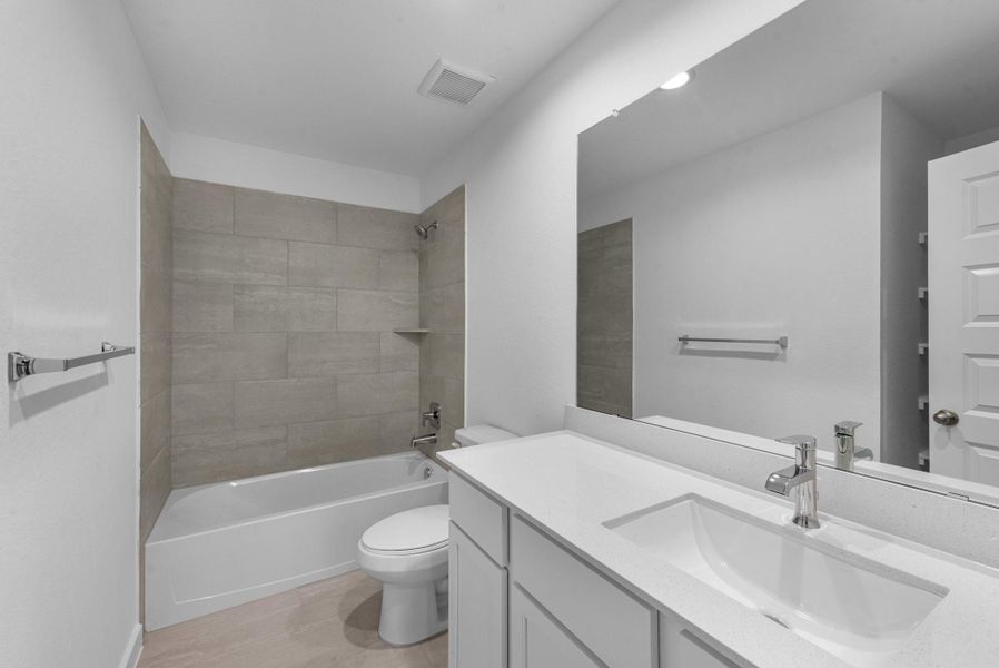 Furnished interior view inside a new home in Cypresswood Landing, Humble (Image 10).