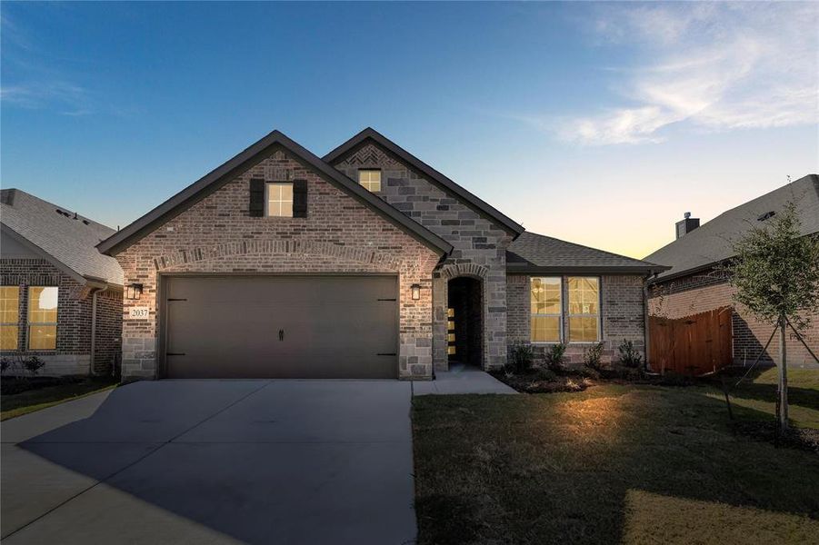 Front exterior of a new home in Northstar, Haslet, TX, highlighting curb appeal (Image 22).