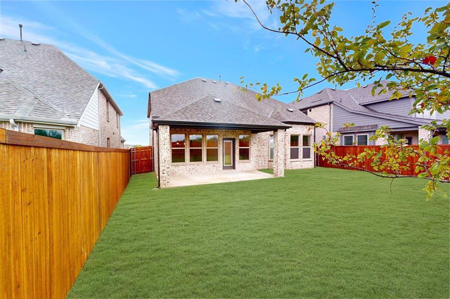 Front exterior of a new home in Lilybrooke at Legacy Hills, Celina, TX, highlighting curb appeal (Image 2).
