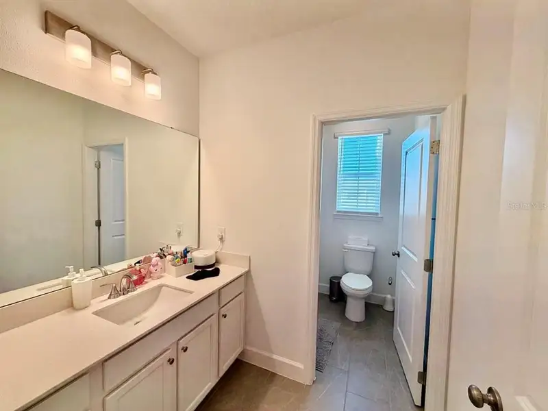 Furnished interior view inside a new home in , Winter Garden (Image 8).