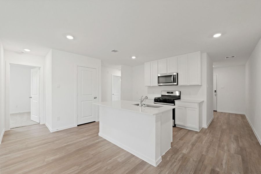 Furnished interior view inside a new home in The Canopies, Splendora (Image 6).