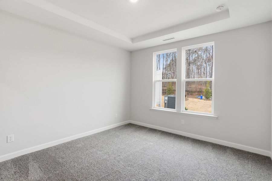 Spacious, unfurnished interior of a new home in Ovation at Sweetbrier, Durham (Image 19).