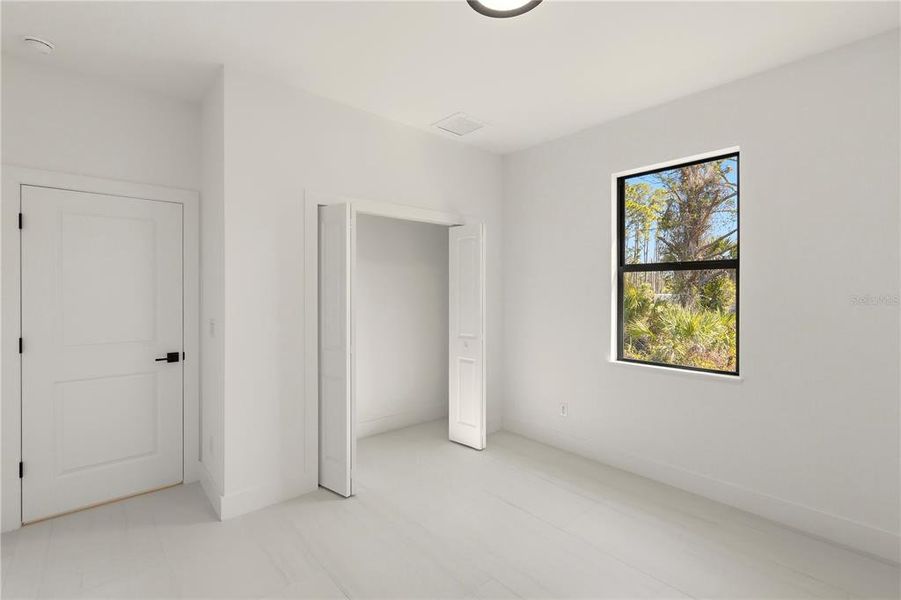 Spacious, unfurnished interior of a new home in , North Port (Image 32).
