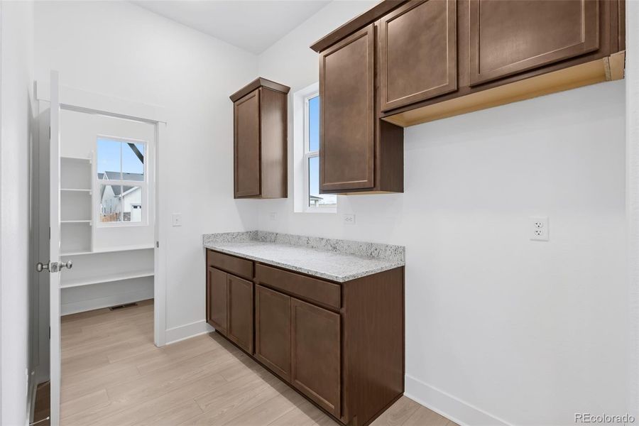 Furnished interior view inside a new home in Painted Prairie Cottage, Aurora (Image 12).