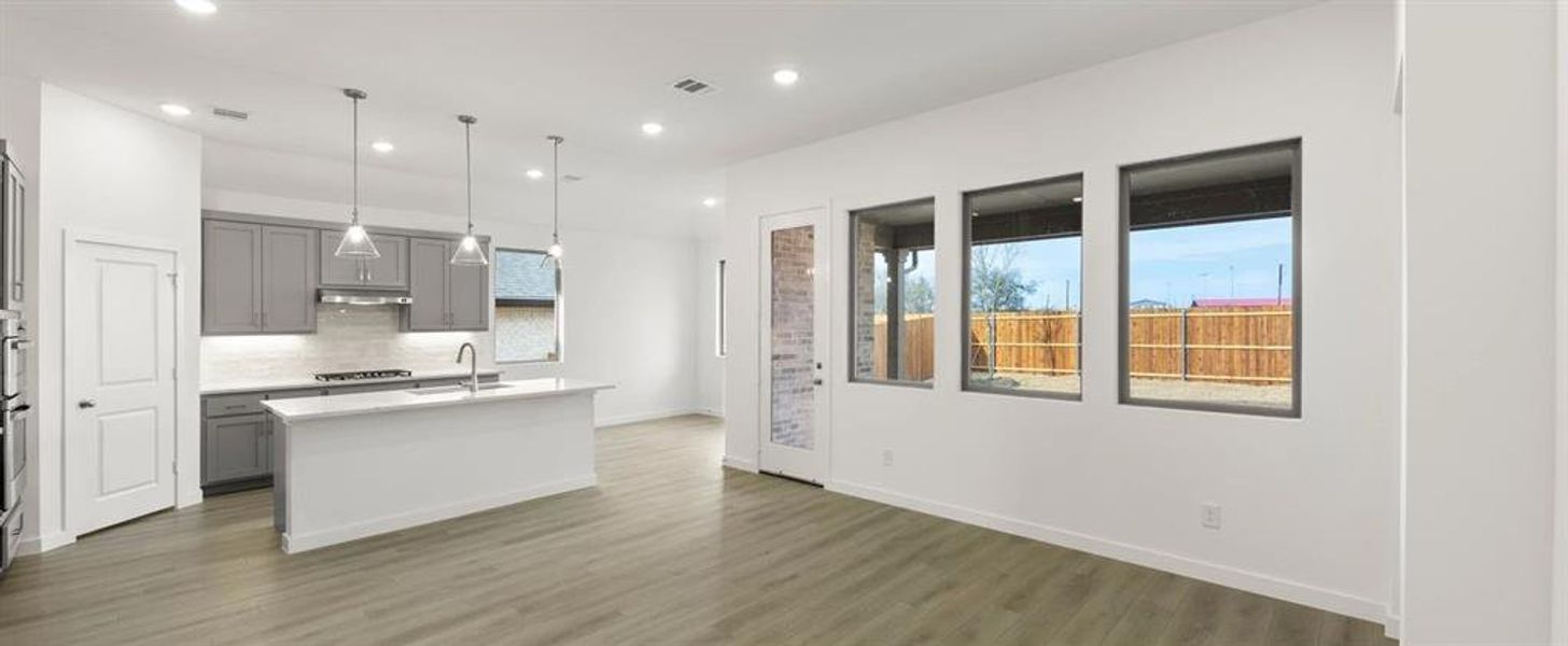 Open Kitchen-Living-Dining Room featuring the Milan Collection