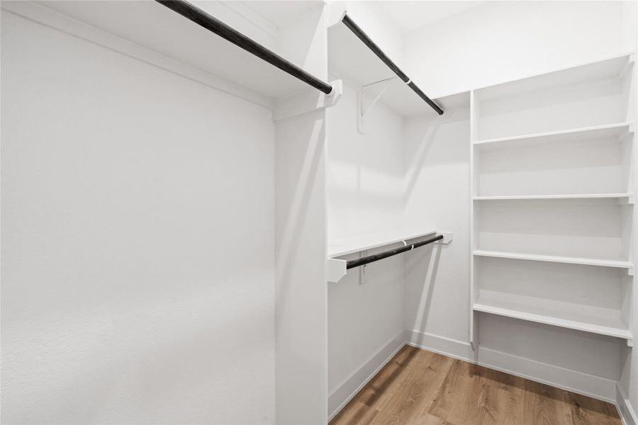 A walk-in closet that redefinesstorage — abundant shelvingand smart design maximizespace without sacrificing style.