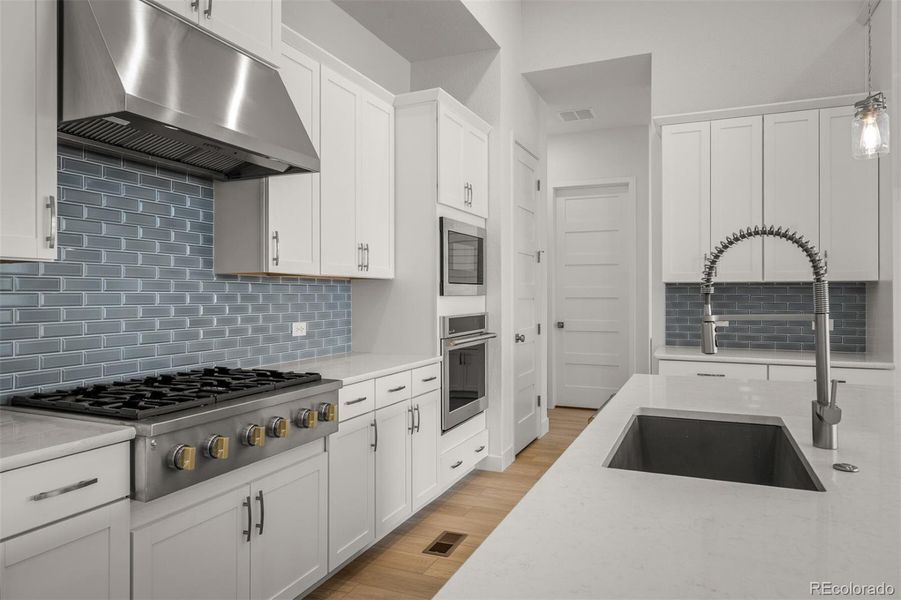 Furnished interior view inside a new home in Cloverleaf - Pinnacle Collection, Monument (Image 4).