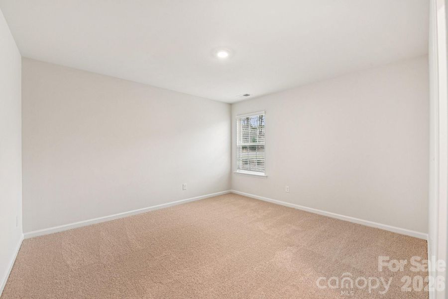 Spacious, unfurnished interior of a new home in Wallace Springs, Statesville (Image 27).